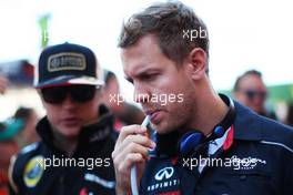 (L to R): Kimi Raikkonen (FIN) Lotus F1 Team with Sebastian Vettel (GER) Red Bull Racing. 26.05.2013. Formula 1 World Championship, Rd 6, Monaco Grand Prix, Monte Carlo, Monaco, Race Day.