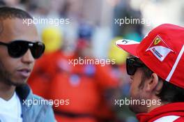 (L to R): Lewis Hamilton (GBR) Mercedes AMG F1 with Fernando Alonso (ESP) Ferrari on the drivers parade. 26.05.2013. Formula 1 World Championship, Rd 6, Monaco Grand Prix, Monte Carlo, Monaco, Race Day.