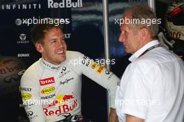 Sebastian Vettel (GER) Red Bull Racing with Dr Helmut Marko (AUT) Red Bull Motorsport Consultant. 23.05.2013. Formula 1 World Championship, Rd 6, Monaco Grand Prix, Monte Carlo, Monaco, Practice Day.