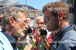 (L to R): Eddie Jordan (IRE) BBC Television Pundit with Andre Villas-Boas (POR) Tottenham Hotspur Manager. 26.05.2013. Formula 1 World Championship, Rd 6, Monaco Grand Prix, Monte Carlo, Monaco, Race Day.