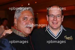 (L to R): Dr. Vijay Mallya (IND) Sahara Force India F1 Team Owner with HSH Prince Albert of Monaco (MON) at the Signature F1 Monaco Party. 23-24.05.2013. Formula 1 World Championship, Rd 6, Monaco Grand Prix, The Signature F1 Boat Party, Monte Carlo, Monaco, Friday.