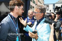 (L to R): Andre Villas-Boas (POR) Tottenham Hotspur Manager with Eddie Jordan (IRE) BBC Television Pundit. 26.05.2013. Formula 1 World Championship, Rd 6, Monaco Grand Prix, Monte Carlo, Monaco, Race Day.