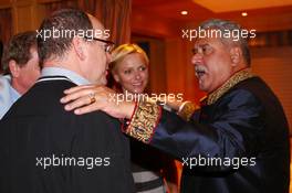 (L to R): HSH Prince Albert of Monaco (MON) with his wife Princess Charlene of Monaco (RSA) and Dr. Vijay Mallya (IND) Sahara Force India F1 Team Owner at the Signature F1 Monaco Party. 23-24.05.2013. Formula 1 World Championship, Rd 6, Monaco Grand Prix, The Signature F1 Boat Party, Monte Carlo, Monaco, Friday.