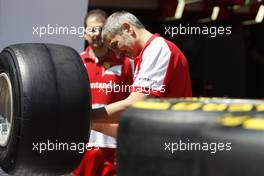 Ferrari mechanic with Pirelli tyres. 22.05.2013. Formula 1 World Championship, Rd 6, Monaco Grand Prix, Monte Carlo, Monaco, Preparation Day.