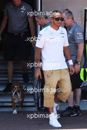 Lewis Hamilton (GBR) Mercedes AMG F1 with his dog Roscoe. 22.05.2013. Formula 1 World Championship, Rd 6, Monaco Grand Prix, Monte Carlo, Monaco, Preparation Day.