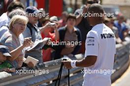 Lewis Hamilton (GBR) Mercedes AMG F1 signs autographs for the fans. 22.05.2013. Formula 1 World Championship, Rd 6, Monaco Grand Prix, Monte Carlo, Monaco, Preparation Day.