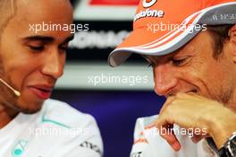 (L to R): Lewis Hamilton (GBR) Mercedes AMG F1 and Jenson Button (GBR) McLaren in the FIA Press Conference. 22.05.2013. Formula 1 World Championship, Rd 6, Monaco Grand Prix, Monte Carlo, Monaco, Preparation Day.
