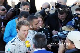 (L to R): Nico Rosberg (GER) Mercedes AMG F1 and team mate Lewis Hamilton (GBR) Mercedes AMG F1 with the media. 04.02.2013. Mercedes AMG F1 W04 Launch, Jerez, Spain.