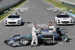 (L to R): Lewis Hamilton (GBR) Mercedes AMG F1 and team mate Nico Rosberg (GER) Mercedes AMG F1 with the new Mercedes AMG F1 W04 and promote new Blackberry sponsorship for the team. 04.02.2013. Mercedes AMG F1 W04 Launch, Jerez, Spain.