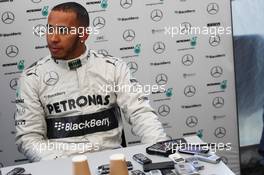 Lewis Hamilton (GBR) Mercedes AMG F1 with the media. 04.02.2013. Mercedes AMG F1 W04 Launch, Jerez, Spain.