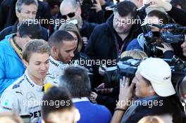 (L to R): Nico Rosberg (GER) Mercedes AMG F1 and team mate Lewis Hamilton (GBR) Mercedes AMG F1 with the media. 04.02.2013. Mercedes AMG F1 W04 Launch, Jerez, Spain.