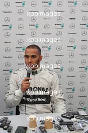 Lewis Hamilton (GBR) Mercedes AMG F1 with the media. 04.02.2013. Mercedes AMG F1 W04 Launch, Jerez, Spain.