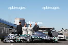 The new Mercedes AMG F1 W04 is unveiled (L to R): Toto Wolff (GER) Mercedes AMG F1 Shareholder and Executive Director; Lewis Hamilton (GBR) Mercedes AMG F1; Nico Rosberg (GER) Mercedes AMG F1; Ross Brawn (GBR) Mercedes AMG F1 Team Principal. 04.02.2013. Mercedes AMG F1 W04 Launch, Jerez, Spain.