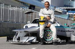 Lewis Hamilton (GBR) Mercedes AMG F1 with the new Mercedes AMG F1 W04. 04.02.2013. Mercedes AMG F1 W04 Launch, Jerez, Spain.