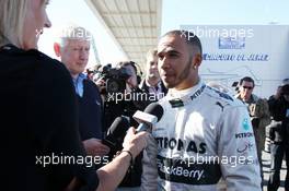 Lewis Hamilton (GBR) Mercedes AMG F1 with the media. 04.02.2013. Mercedes AMG F1 W04 Launch, Jerez, Spain.