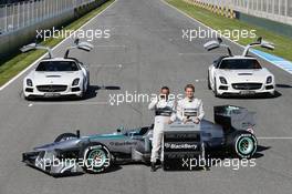 (L to R): Lewis Hamilton (GBR) Mercedes AMG F1 and team mate Nico Rosberg (GER) Mercedes AMG F1 with the new Mercedes AMG F1 W04 and promote new Blackberry sponsorship for the team. 04.02.2013. Mercedes AMG F1 W04 Launch, Jerez, Spain.