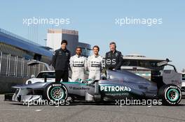 The new Mercedes AMG F1 W04 is unveiled (L to R): Toto Wolff (GER) Mercedes AMG F1 Shareholder and Executive Director; Lewis Hamilton (GBR) Mercedes AMG F1; Nico Rosberg (GER) Mercedes AMG F1; Ross Brawn (GBR) Mercedes AMG F1 Team Principal. 04.02.2013. Mercedes AMG F1 W04 Launch, Jerez, Spain.