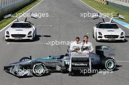 (L to R): Lewis Hamilton (GBR) Mercedes AMG F1 and team mate Nico Rosberg (GER) Mercedes AMG F1 with the new Mercedes AMG F1 W04 and promote new Blackberry sponsorship for the team. 04.02.2013. Mercedes AMG F1 W04 Launch, Jerez, Spain.