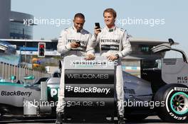 Lewis Hamilton (GBR) Mercedes AMG F1 and team mate with the new Mercedes AMG F1 W04 promote new sponsors Blackberry. 04.02.2013. Mercedes AMG F1 W04 Launch, Jerez, Spain.