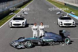 (L to R): Lewis Hamilton (GBR) Mercedes AMG F1 and team mate Nico Rosberg (GER) Mercedes AMG F1 with the new Mercedes AMG F1 W04. 04.02.2013. Mercedes AMG F1 W04 Launch, Jerez, Spain.