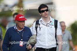 (L to R): Niki Lauda (AUT) Mercedes Non-Executive Chairman with Toto Wolff (GER) Mercedes AMG F1 Shareholder and Executive Director. 22.03.2013. Formula 1 World Championship, Rd 2, Malaysian Grand Prix, Sepang, Malaysia, Friday.