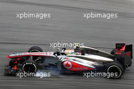 Sergio Perez (MEX) McLaren MP4-28 locks up under braking. 22.03.2013. Formula 1 World Championship, Rd 2, Malaysian Grand Prix, Sepang, Malaysia, Friday.