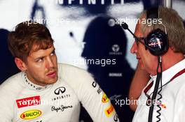 (L to R): Sebastian Vettel (GER) Red Bull Racing with Dr Helmut Marko (AUT) Red Bull Motorsport Consultant. 22.03.2013. Formula 1 World Championship, Rd 2, Malaysian Grand Prix, Sepang, Malaysia, Friday.