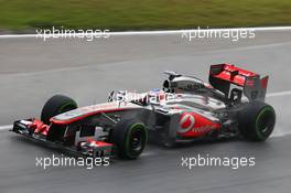 Jenson Button (GBR) McLaren MP4-28. 22.03.2013. Formula 1 World Championship, Rd 2, Malaysian Grand Prix, Sepang, Malaysia, Friday.