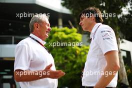 (L to R): Dr Helmut Marko (AUT) Red Bull Motorsport Consultant with Toto Wolff (GER) Mercedes AMG F1 Shareholder and Executive Director. 22.03.2013. Formula 1 World Championship, Rd 2, Malaysian Grand Prix, Sepang, Malaysia, Friday.