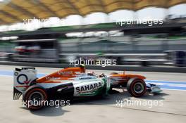 Adrian Sutil (GER) Sahara Force India VJM06 leaves the pits. 22.03.2013. Formula 1 World Championship, Rd 2, Malaysian Grand Prix, Sepang, Malaysia, Friday.