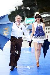 Jean Todt (FRA) FIA President with Michelle Yeoh (MAL). 24.03.2013. Formula 1 World Championship, Rd 2, Malaysian Grand Prix, Sepang, Malaysia, Sunday.