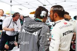 Lewis Hamilton (GBR) Mercedes AMG F1 on the grid. 24.03.2013. Formula 1 World Championship, Rd 2, Malaysian Grand Prix, Sepang, Malaysia, Sunday.