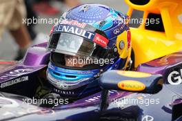 Sebastian Vettel (GER) Red Bull Racing RB9 on the grid. 24.03.2013. Formula 1 World Championship, Rd 2, Malaysian Grand Prix, Sepang, Malaysia, Sunday.