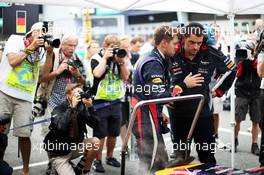Sebastian Vettel (GER) Red Bull Racing with Guillaume Rocquelin  (ITA) Red Bull Racing Race Engineer. 24.03.2013. Formula 1 World Championship, Rd 2, Malaysian Grand Prix, Sepang, Malaysia, Sunday.