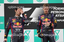The podium (L to R): second placed Mark Webber (AUS) Red Bull Racing and team mate, race winner Sebastian Vettel (GER) Red Bull Racing. 24.03.2013. Formula 1 World Championship, Rd 2, Malaysian Grand Prix, Sepang, Malaysia, Sunday.