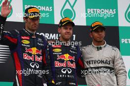 1st place for Sebastian Vettel (GER) Red Bull Racing, 2nd place for Mark Webber (AUS) Red Bull Racing and 3rd place for Lewis Hamilton (GBR) Mercedes AMG F1  24.03.2013. Formula 1 World Championship, Rd 2, Malaysian Grand Prix, Sepang, Malaysia, Sunday.