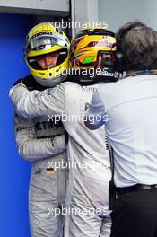 (L to R): fourth placed Nico Rosberg (GER) Mercedes AMG F1 with third placed team mate Lewis Hamilton (GBR) Mercedes AMG F1 in pfe. 24.03.2013. Formula 1 World Championship, Rd 2, Malaysian Grand Prix, Sepang, Malaysia, Sunday.