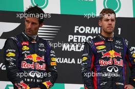 1st place Sebastian Vettel (GER) Red Bull Racing and 2nd place Mark Webber (AUS) Red Bull Racing .  24.03.2013. Formula 1 World Championship, Rd 2, Malaysian Grand Prix, Sepang, Malaysia, Sunday.