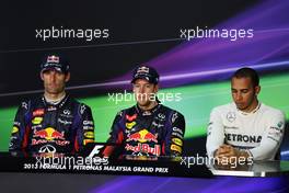 The post race FIA Press Conference (L to R): Mark Webber (AUS) Red Bull Racing, second; Sebastian Vettel (GER) Red Bull Racing, race winner; Lewis Hamilton (GBR) Mercedes AMG F1, third. 24.03.2013. Formula 1 World Championship, Rd 2, Malaysian Grand Prix, Sepang, Malaysia, Sunday.