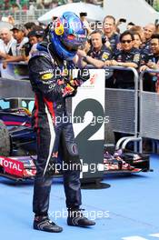 Race winner Sebastian Vettel (GER) Red Bull Racing RB9 celebrates in parc ferme. 24.03.2013. Formula 1 World Championship, Rd 2, Malaysian Grand Prix, Sepang, Malaysia, Sunday.