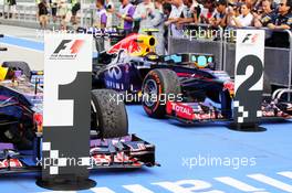 The Red Bull Racing RB9s of race winner Sebastian Vettel (GER) Red Bull Racing and team mate Mark Webber (AUS) Red Bull Racing in parc ferme.  24.03.2013. Formula 1 World Championship, Rd 2, Malaysian Grand Prix, Sepang, Malaysia, Sunday.