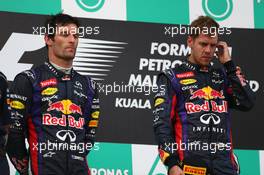 1st place Sebastian Vettel (GER) Red Bull Racing and 2nd place for Mark Webber (AUS) Red Bull Racing.  24.03.2013. Formula 1 World Championship, Rd 2, Malaysian Grand Prix, Sepang, Malaysia, Sunday.