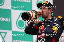 1st place Sebastian Vettel (GER) Red Bull Racing.  24.03.2013. Formula 1 World Championship, Rd 2, Malaysian Grand Prix, Sepang, Malaysia, Sunday.