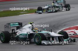 Lewis Hamilton (GBR) Mercedes AMG F1 W04 leads team mate Nico Rosberg (GER) Mercedes AMG F1 W04. 24.03.2013. Formula 1 World Championship, Rd 2, Malaysian Grand Prix, Sepang, Malaysia, Sunday.