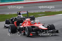 Jules Bianchi (FRA) Marussia F1 Team MR02 leads Valtteri Bottas (FIN) Williams FW35. 24.03.2013. Formula 1 World Championship, Rd 2, Malaysian Grand Prix, Sepang, Malaysia, Sunday.