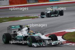 Lewis Hamilton (GBR) Mercedes AMG F1 W04 leads team mate Nico Rosberg (GER) Mercedes AMG F1 W04. 24.03.2013. Formula 1 World Championship, Rd 2, Malaysian Grand Prix, Sepang, Malaysia, Sunday.