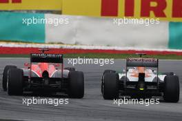 Paul di Resta (GBR) Sahara Force India VJM06 and Jules Bianchi (FRA) Marussia F1 Team MR02. 24.03.2013. Formula 1 World Championship, Rd 2, Malaysian Grand Prix, Sepang, Malaysia, Sunday.