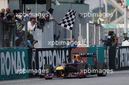 Race winner Sebastian Vettel (GER) Red Bull Racing RB9 celebrates at the end of the race. 24.03.2013. Formula 1 World Championship, Rd 2, Malaysian Grand Prix, Sepang, Malaysia, Sunday.