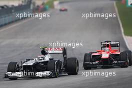 Valtteri Bottas (FIN) Williams FW35 leads Max Chilton (GBR) Marussia F1 Team MR02. 24.03.2013. Formula 1 World Championship, Rd 2, Malaysian Grand Prix, Sepang, Malaysia, Sunday.