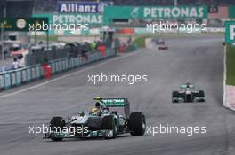 Lewis Hamilton (GBR) Mercedes AMG F1 W04 leads team mate Nico Rosberg (GER) Mercedes AMG F1 W04. 24.03.2013. Formula 1 World Championship, Rd 2, Malaysian Grand Prix, Sepang, Malaysia, Sunday.